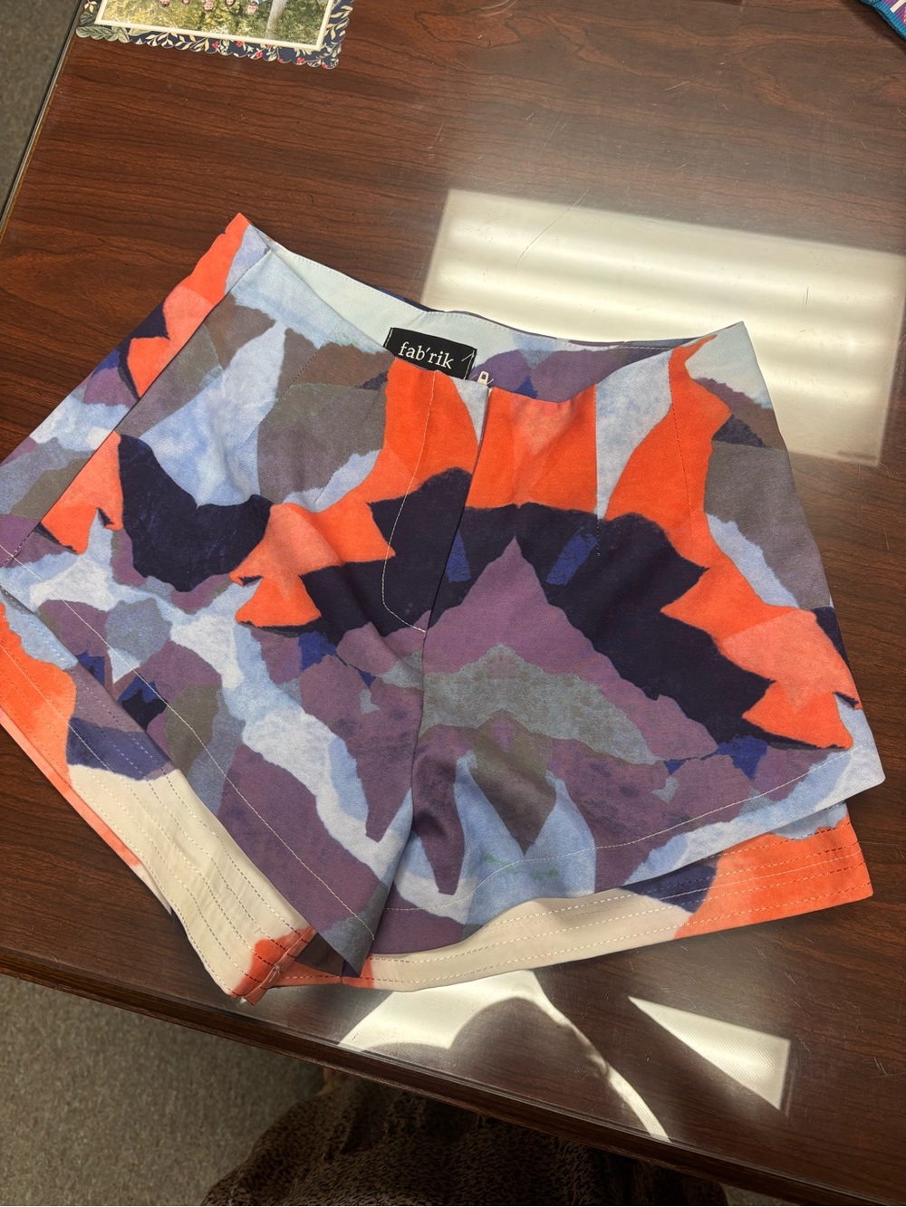 fab'rik High Waist Abstract Print Shorts in Orange, Purple, Blue